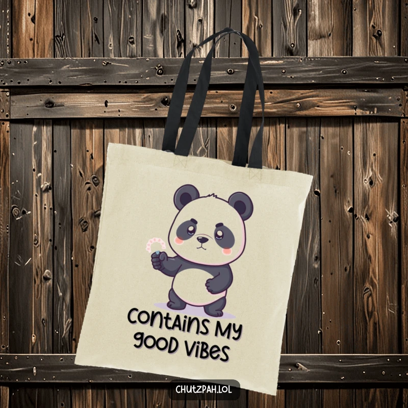 Funny panda bear protecting its belongings with an invisible force field, shown on a sturdy tote bag.
